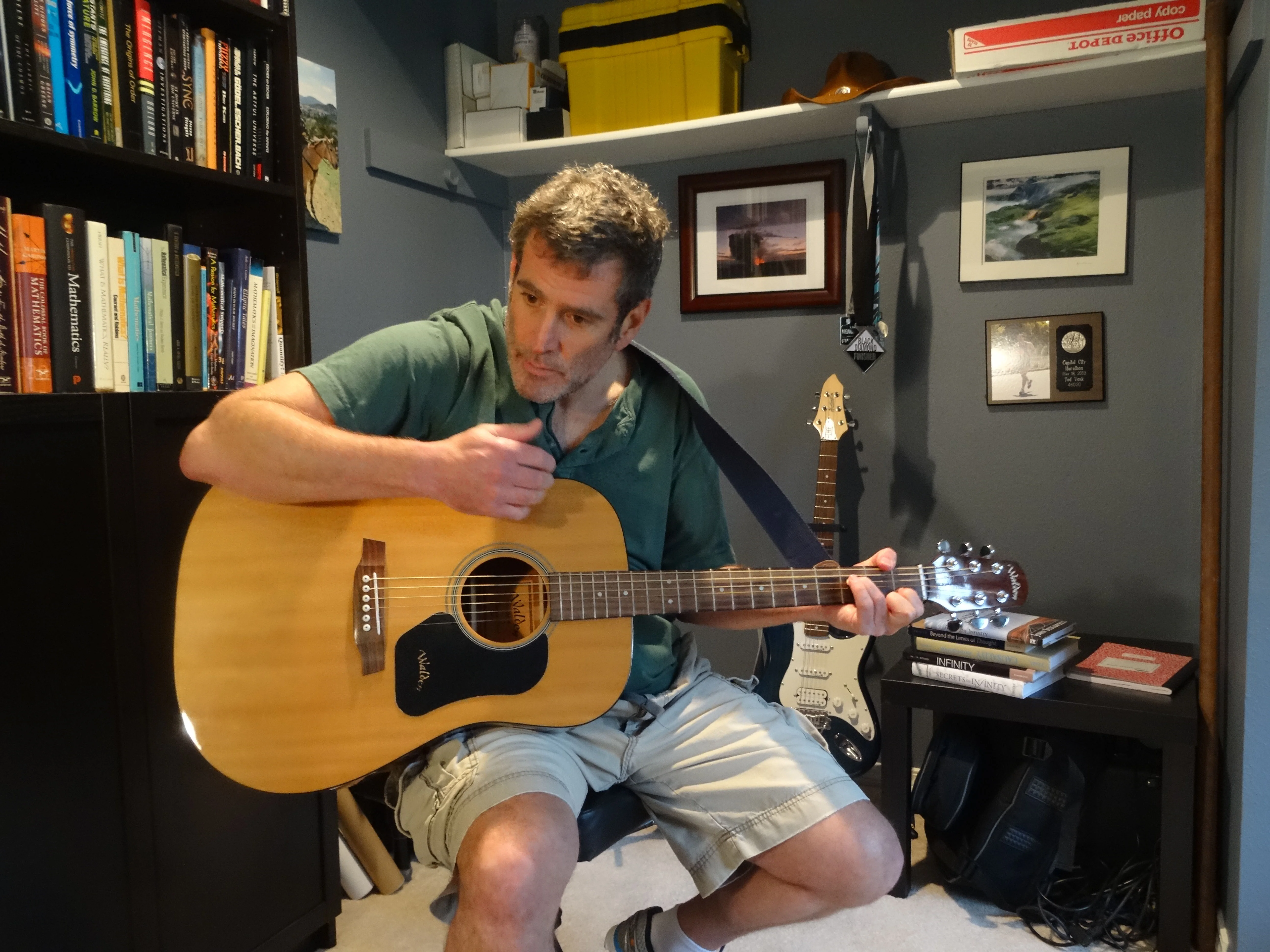 a man playing a guitar